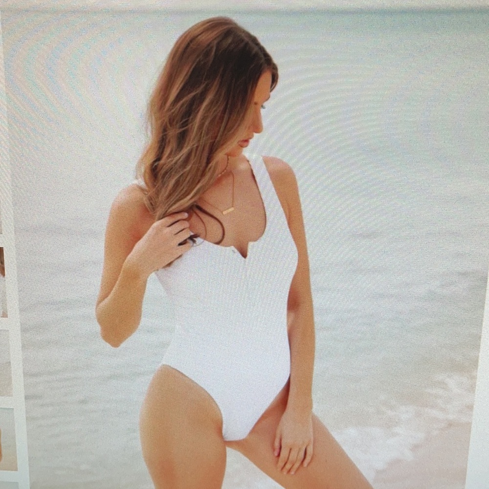 Snap front one piece bathing suit